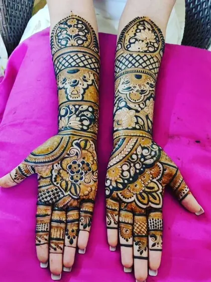 A classic design featuring floral mandalas and elephant motifs, with clean and sharp line work.