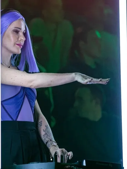 Another look from the TV show, this time with purple hair. We love to change our style and have fun with our image.