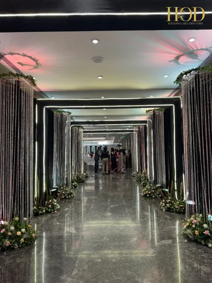 This view of the crystal hallway includes modern LED strip lighting along the ceiling and floor, adding another layer of contemporary elegance. The combination of crystal and LED light creates a futuristic yet glamorous effect.