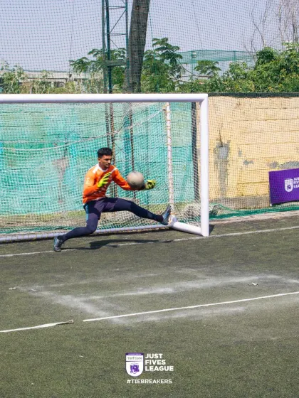 A goalkeeper makes a spectacular diving save, a moment of pure athleticism that can change the course of a game.