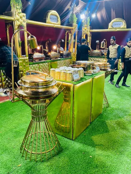 The elegant setup of the Mughlai and Roti counter, with staff ready to assist.