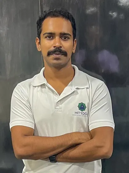 A simple portrait in my HITYOGA branded shirt. I believe in honesty and integrity, and I bring these values to every class I teach.