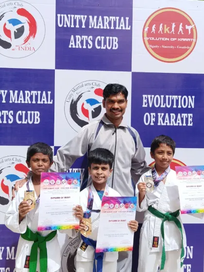 Posing with some of our winners from the South Indian Open Karate Championship. We train not just to fight, but to win with honor.