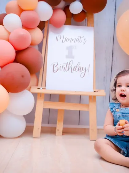 A candid moment of the birthday girl enjoying her party. We look for these unposed shots that show your child's curiosity and delight on their big day.