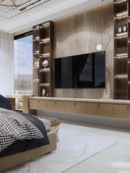 This spacious master bedroom combines modern design with warm, natural elements. The TV wall unit features extensive shelving and beautiful wood grain, creating a functional and stylish focal point.