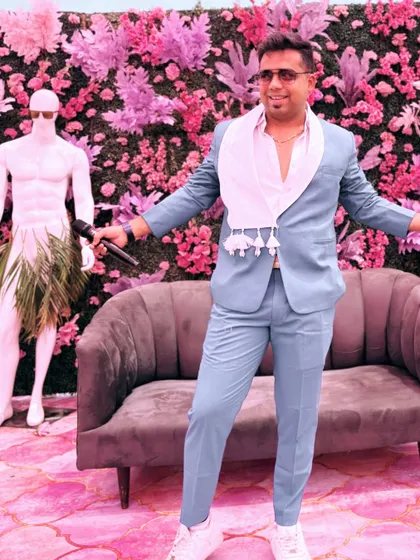 Who's the mannequin? Posing with some interesting decor in a stylish blue suit. My outfits are always a conversation starter.