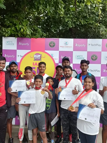 Another podium picture with the team, showcasing our medals and certificates. We are proud of our collective achievements.
