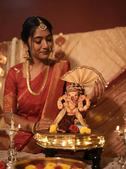 Another shot from the Ganesh Chaturthi puja, showcasing the festive decor and my traditional look.