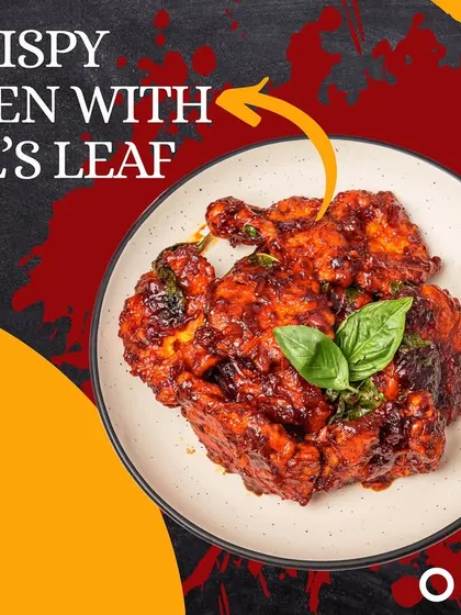 This dish combines crispy fried chicken with the fresh, aromatic flavor of basil leaves. The chicken is tossed in a spicy sauce, creating a delicious Indo-Chinese fusion with a fragrant herbal note.