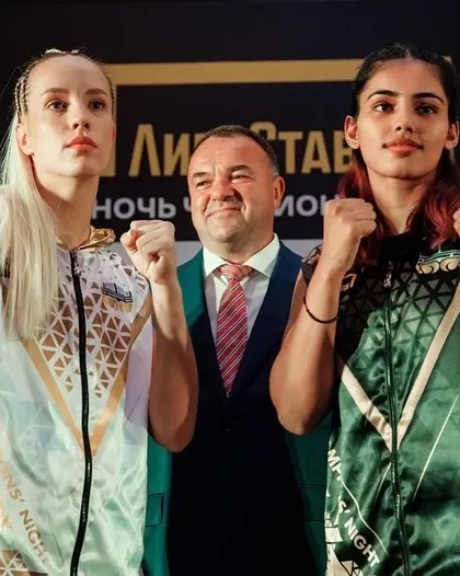 Two national representatives ready for battle. Raj Sahiba and her opponent pose after the weigh-in.