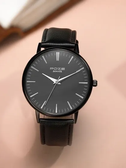 This overhead shot places a black Sonata watch in a lifestyle context. I used a book and a leather wallet as props to create a scene that feels personal and speaks to a classic, intellectual aesthetic.
