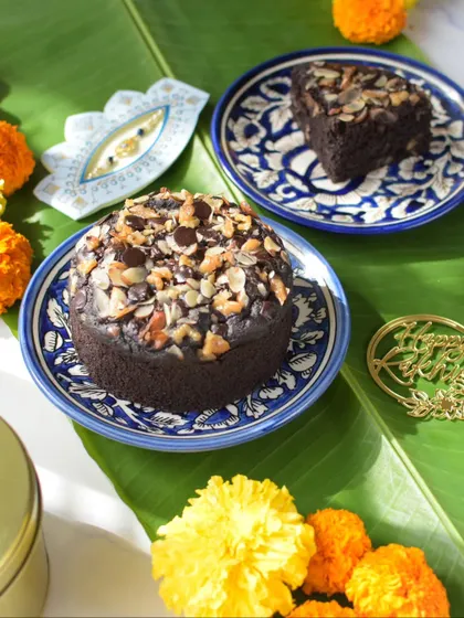 Another festive shot of my Ragi Chocolate Walnut Cake, surrounded by marigold flowers.