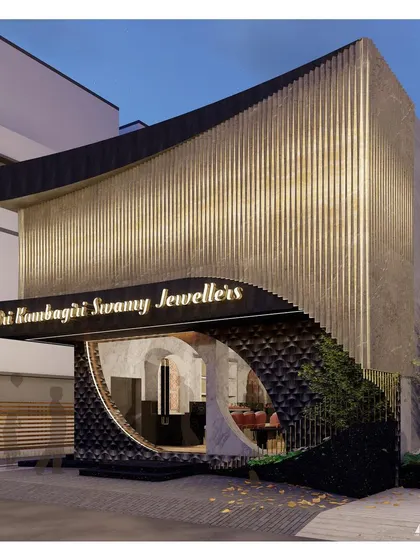 A perspective of the jewellery showroom at night. The circular window offers a curated glimpse into the interior, sparking curiosity while the illuminated signage and architectural lighting work in harmony to create a sophisticated and welcoming atmosphere.