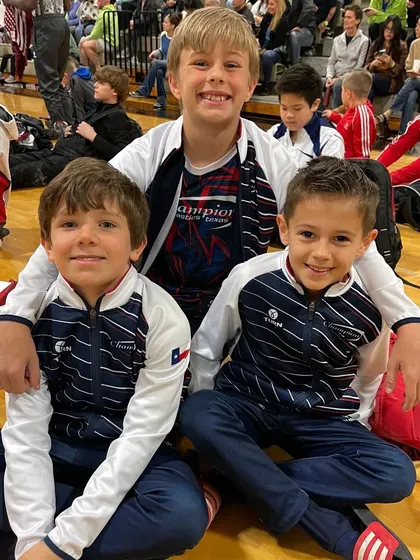 Teammates and friends, our Compulsory Men's Team enjoying a moment together at the State Championships.