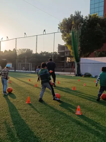 Our youngest players learning the basics of ball control through cone drills. Every session is a mix of hard work and fun.