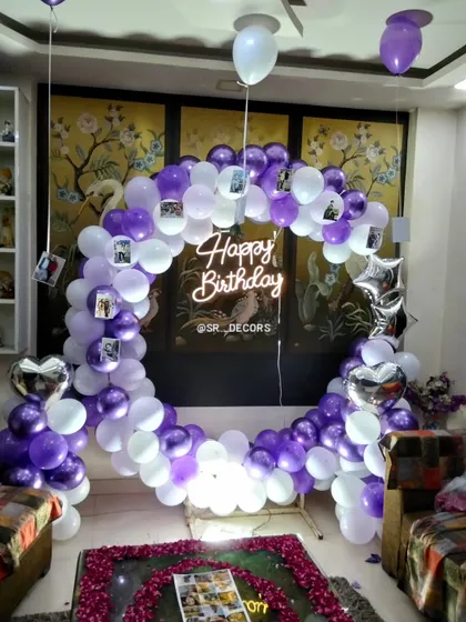 The photo-adorned balloon ring is a heartfelt and custom way to celebrate a milestone 18th birthday.