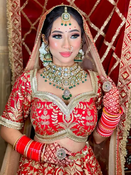 A final look at our happy and radiant bride. Her skin is glowing, and the makeup enhances her natural beauty.
