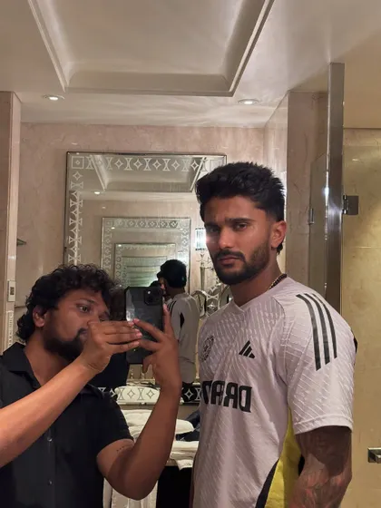 Capturing the details of Nitish Kumar Reddy's haircut.