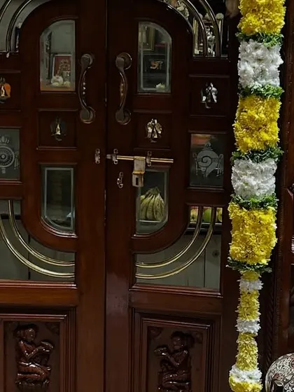 We adorn the main entrance of the home with traditional flower garlands for weddings and housewarmings to welcome guests and positive energy.