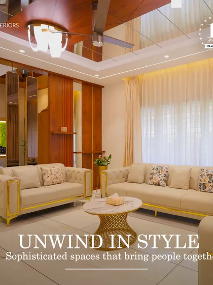 Unwind in style in this sophisticated living space, featuring sofas with gold-finished frames and a mirrored ceiling that adds a touch of glamour.