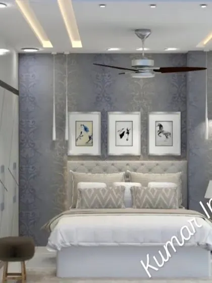 A similar view of the blue-themed bedroom, showing the custom wardrobe and integrated dressing unit.