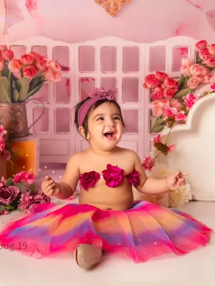 A moment of pure joy and laughter captured during our vibrant and flowery photoshoot.
