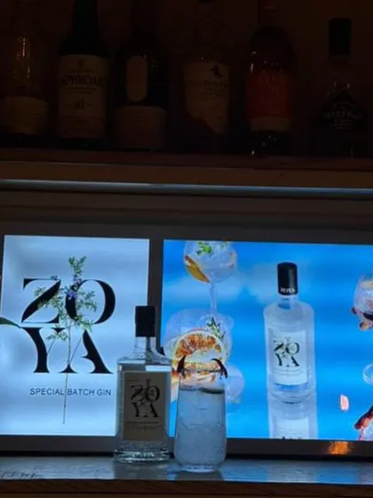 Another shot of our Zoya Gin highball, showcased against a branded lightbox. Visual branding is key at corporate events.