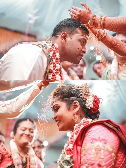 A close-up of the Akshata ceremony, capturing the moment the blessed rice is showered upon the couple.