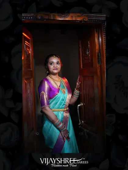 Shravya looking absolutely radiant. The rich contrast of the saree and the traditional jewelry makes for a perfect engagement look.