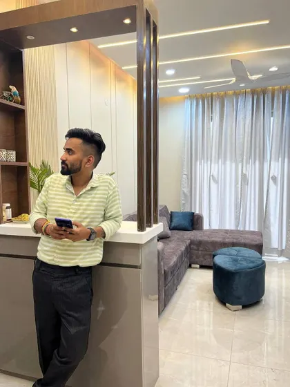 Posing at our completed Gurgaon project. We handle everything from design to execution.