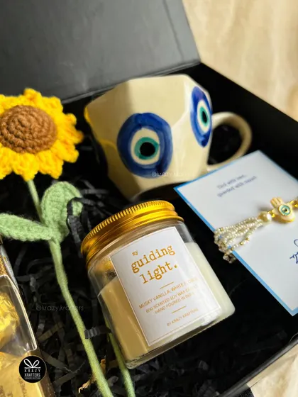 Adding a little sunshine to the 'Jigar Ka Tukda' hamper with a crochet sunflower and a 'guiding light' candle.