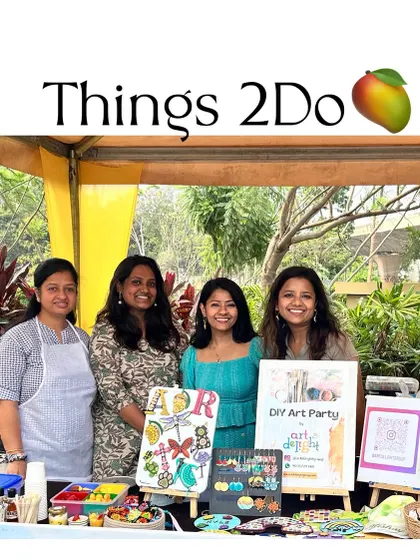 My team of co-artists and me at our vibrant stall at the "Things 2 Do" event. We had a blast sharing our love for art.
