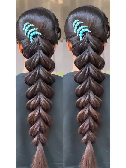 A close-up of the finished braid, showing the texture and volume.