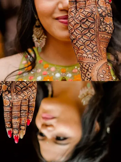 The reflection shot beautifully captures both the bride's face and the detailed henna pattern on her hand.
