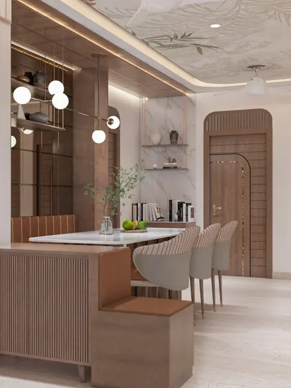 Another view of the dining space, showing the custom bench seating and the way the design flows into the rest of the home. The arched doorways add a classic architectural touch.