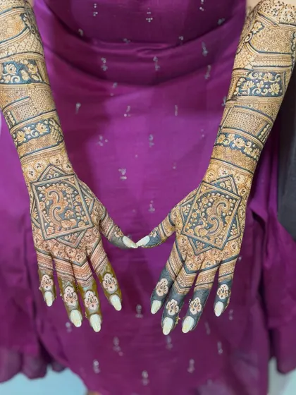For the bride who loves classic beauty, a full bridal mehendi with intricate patterns and perfect symmetry. I focus on fine lines and a balanced design that covers the hands and arms beautifully.