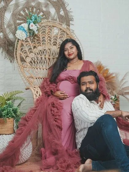 A relaxed portrait of a couple in the boho setup. This shows how we can capture both formal and casual moments during your studio session.