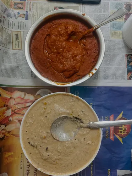 Our two freshly made chutneys, a spicy red chutney and a cooling coconut chutney, served with our South Indian dishes.