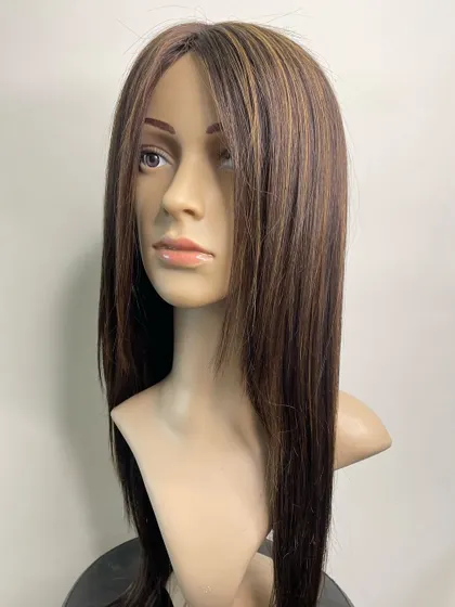 Another angle of our luxurious silk wig, showing how the hair can be styled and how it frames the face naturally.