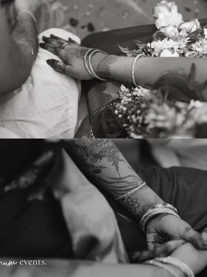 The joining of hands, a symbolic and beautiful moment captured in timeless black and white.