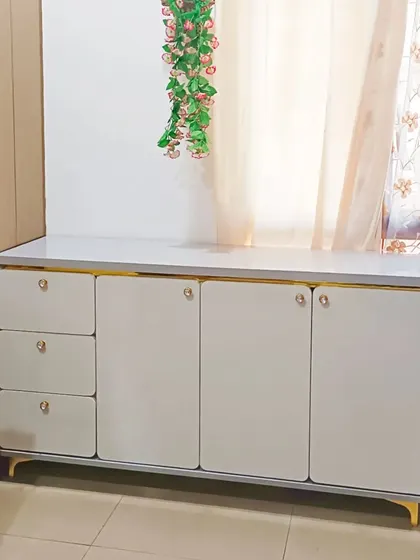 The finished console table, providing stylish and practical storage in the living area.