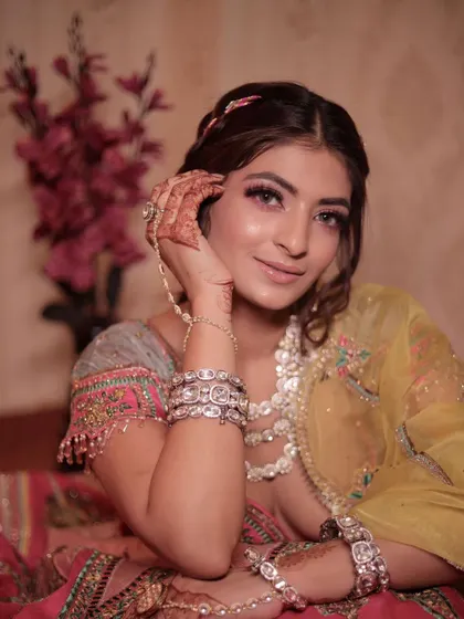 A beautiful portrait of our mehendi bride, looking like a Bollywood diva with her colorful makeup and stunning jewelry.
