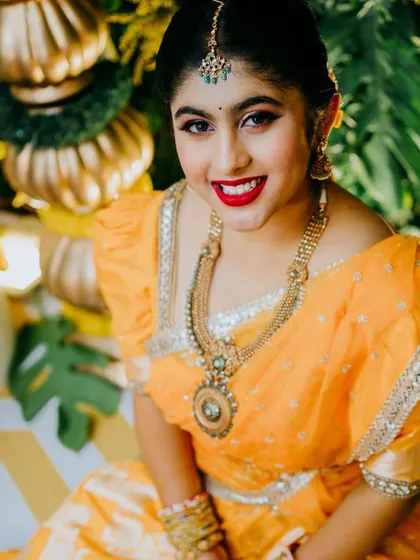 Additional portraits from the Haldi ceremony, showcasing the beautiful makeup and traditional styling from different angles.