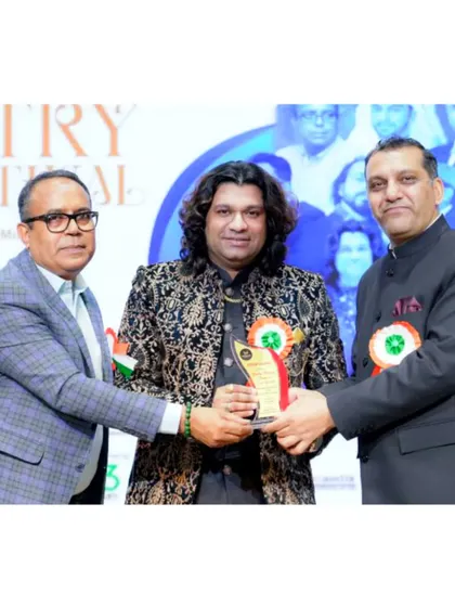 Another glimpse from the Dubai Poetry Festival award ceremony. Holding this award is a reminder of the blessings of the Almighty and the love of my fans.