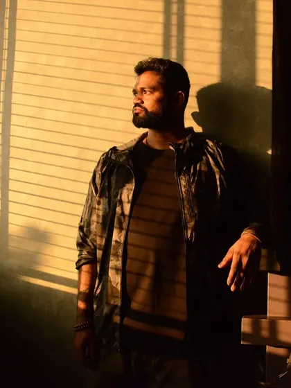 A quiet, contemplative portrait of me in the golden hour light, showing a different, more introspective side.