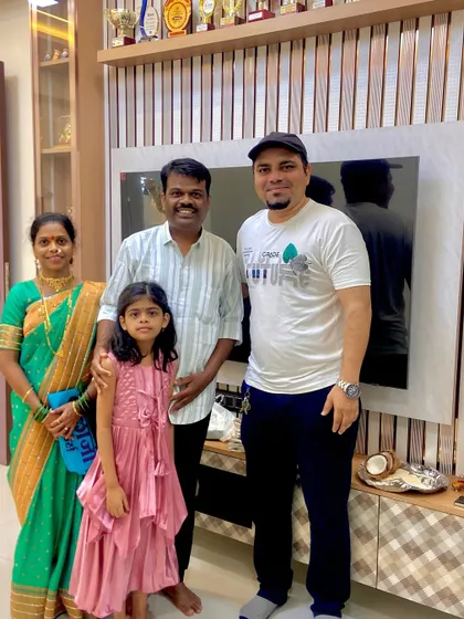 A proud moment with the Bhosle family in front of their new TV unit. We designed this piece with a mix of checkered and fluted panels to match their style.
