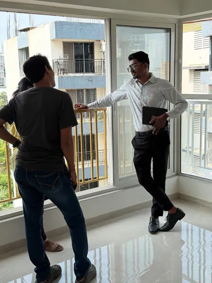 A meeting with clients in their new, empty apartment. This is the beginning of our journey to turn this space into their dream home.