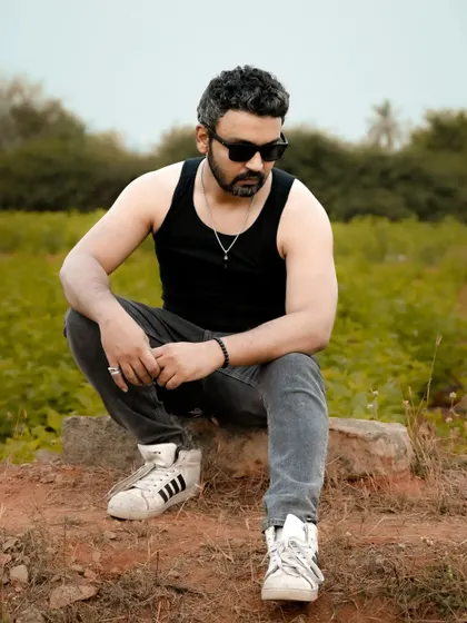 Even photographers like to get clicked sometimes. A relaxed portrait of me in an outdoor setting.