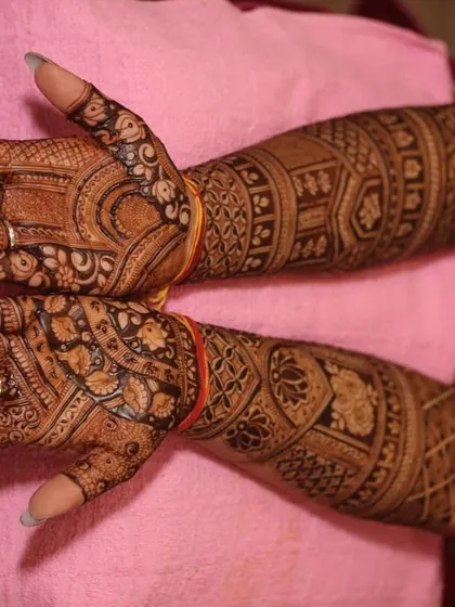 A close-up of a completed bridal mehandi, showing the intricate patterns and fine lines. This design is a beautiful example of traditional Rajasthani artwork.