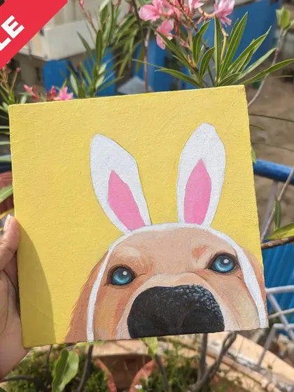 A playful peekaboo painting of a dog wearing bunny ears. This piece is full of charm and personality.